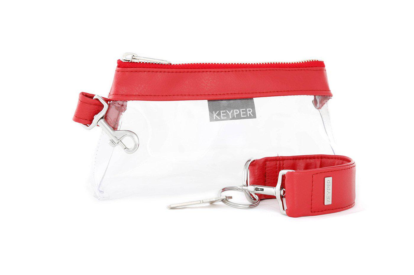 A red vegan leather wristlet set from KEYPER, featuring a gold zipper and detachable strap with gold hardware.