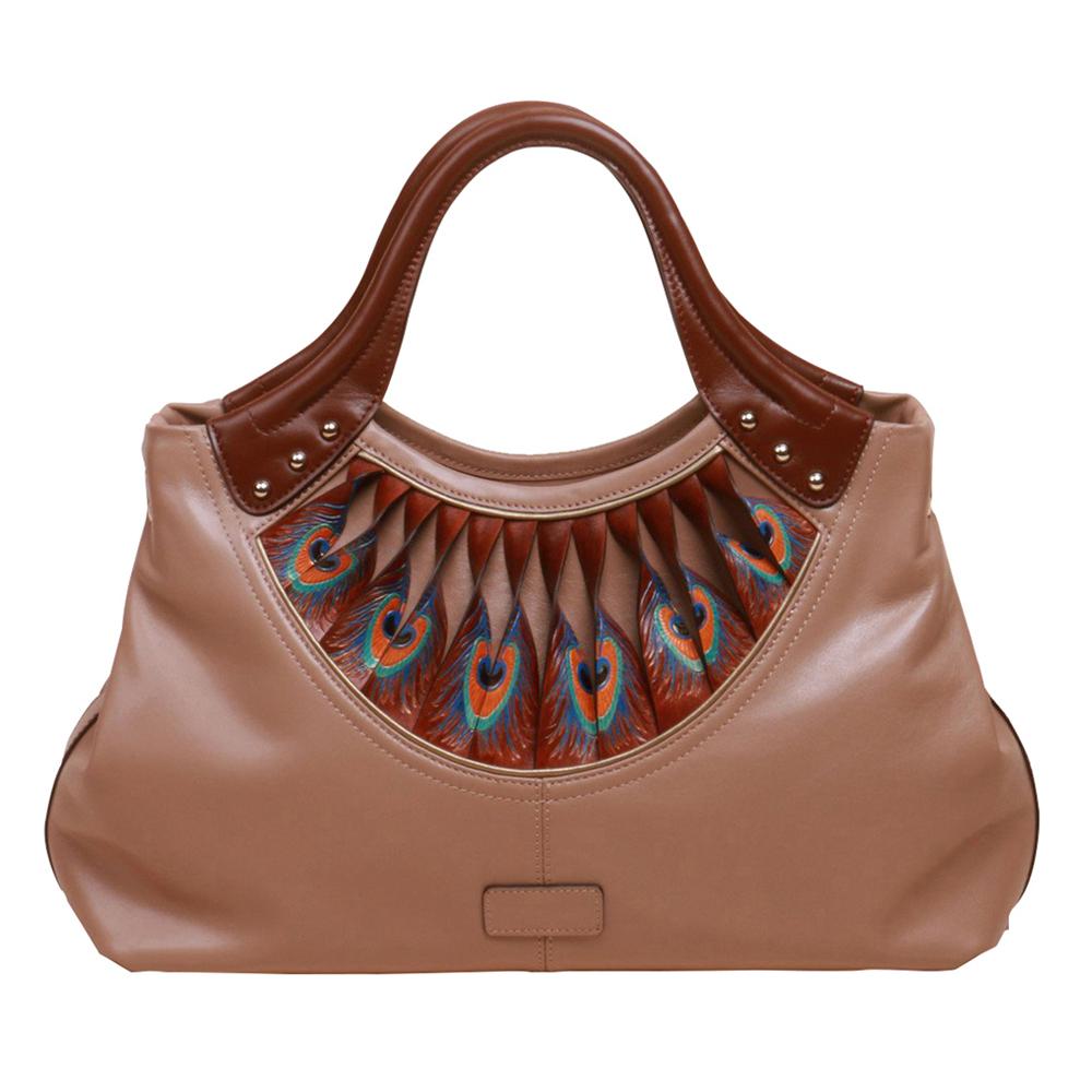 The Feather Brown Tote by Bellorita is a tan leather handbag with brown handles, showcasing a peacock feather design near the opening.