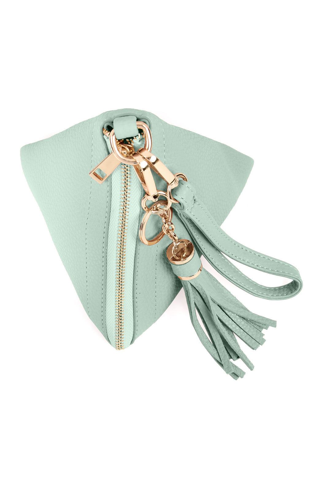 A person in a white shirt and jeans is holding the Riah Fashion Pyramid Shape Tassel Wristlet Leather Bag in orange.