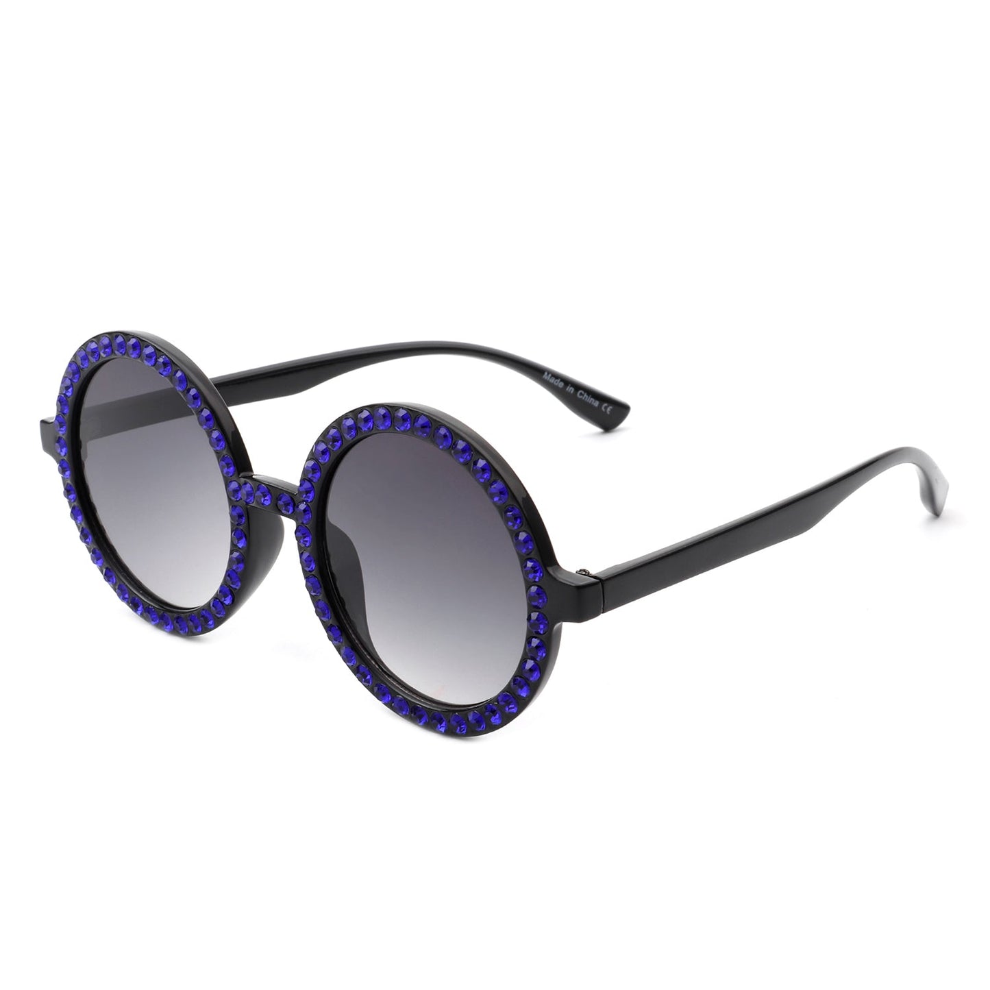 Round sunglasses by Cramilo Eyewear, Dreamwey model, featuring rhinestone-studded white frames with dark lenses.
