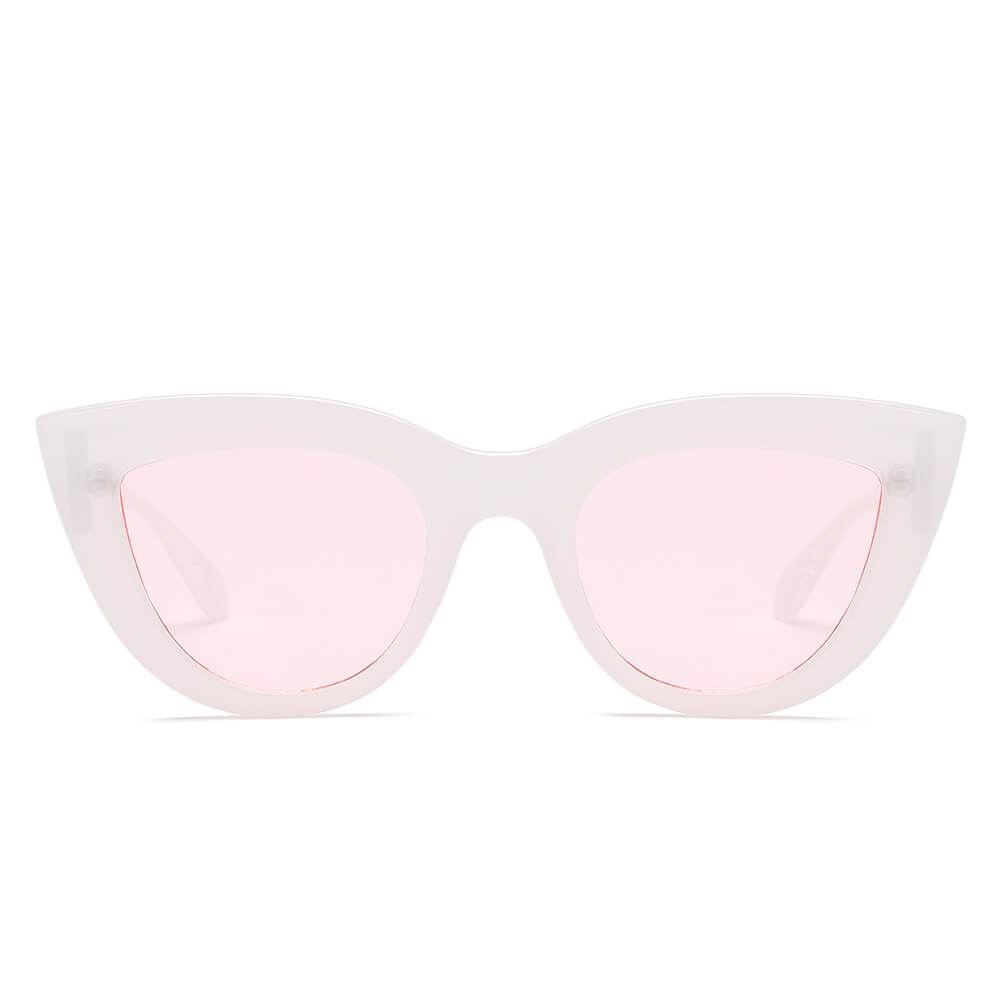 BOYDS women’s round cat-eye sunglasses by Cramilo Eyewear feature pink glittery frames and dark lenses on a white background.
