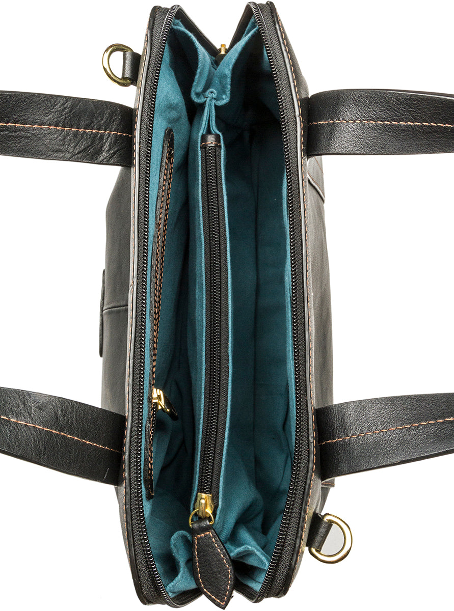The Hidesign Cerys Leather Satchel is a black handbag with brown stitching, gold hardware, two handles, and an adjustable shoulder strap.