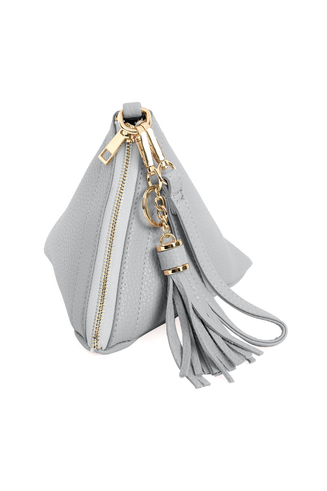 A person in a white shirt and jeans is holding the Riah Fashion Pyramid Shape Tassel Wristlet Leather Bag in orange.