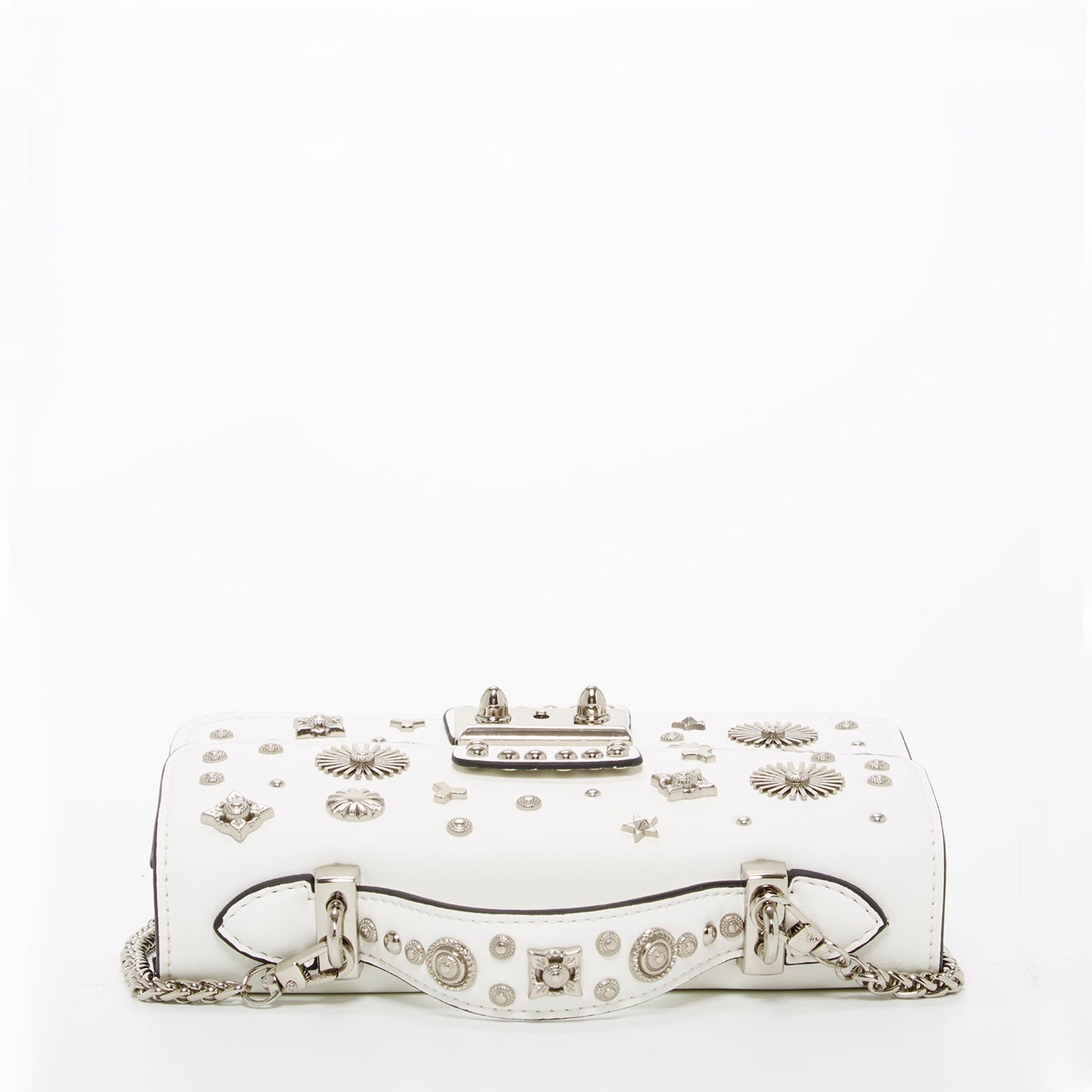 The Hollywood White Leather Crossbody Bag by SUSU features silver stud embellishments, a chain strap, a top handle, and a front clasp with the SUSU brand name.