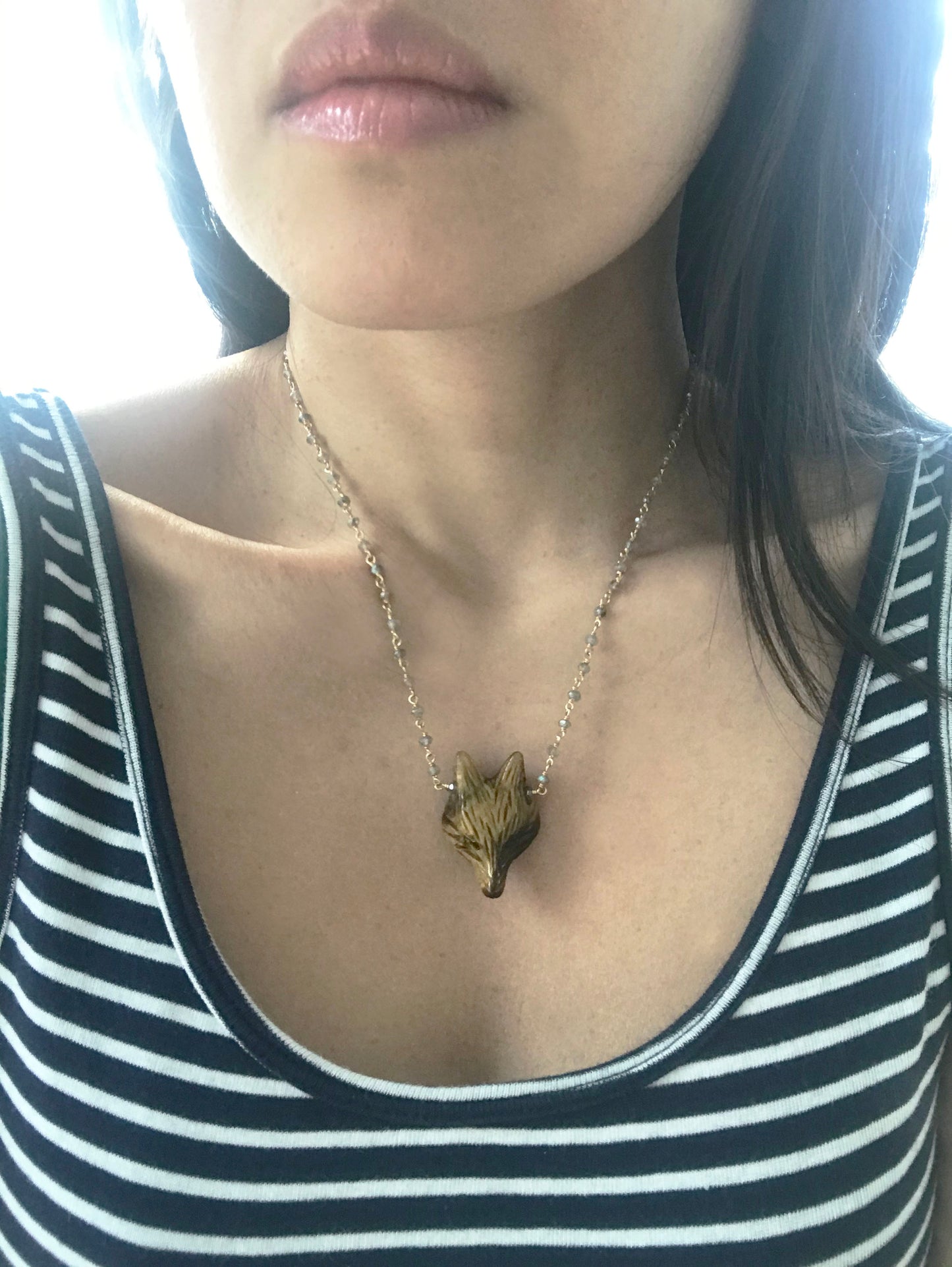 Gena Myints Labradorite and Tiger Eye Fox Necklace features a central fox pendant with an adjustable clasp.