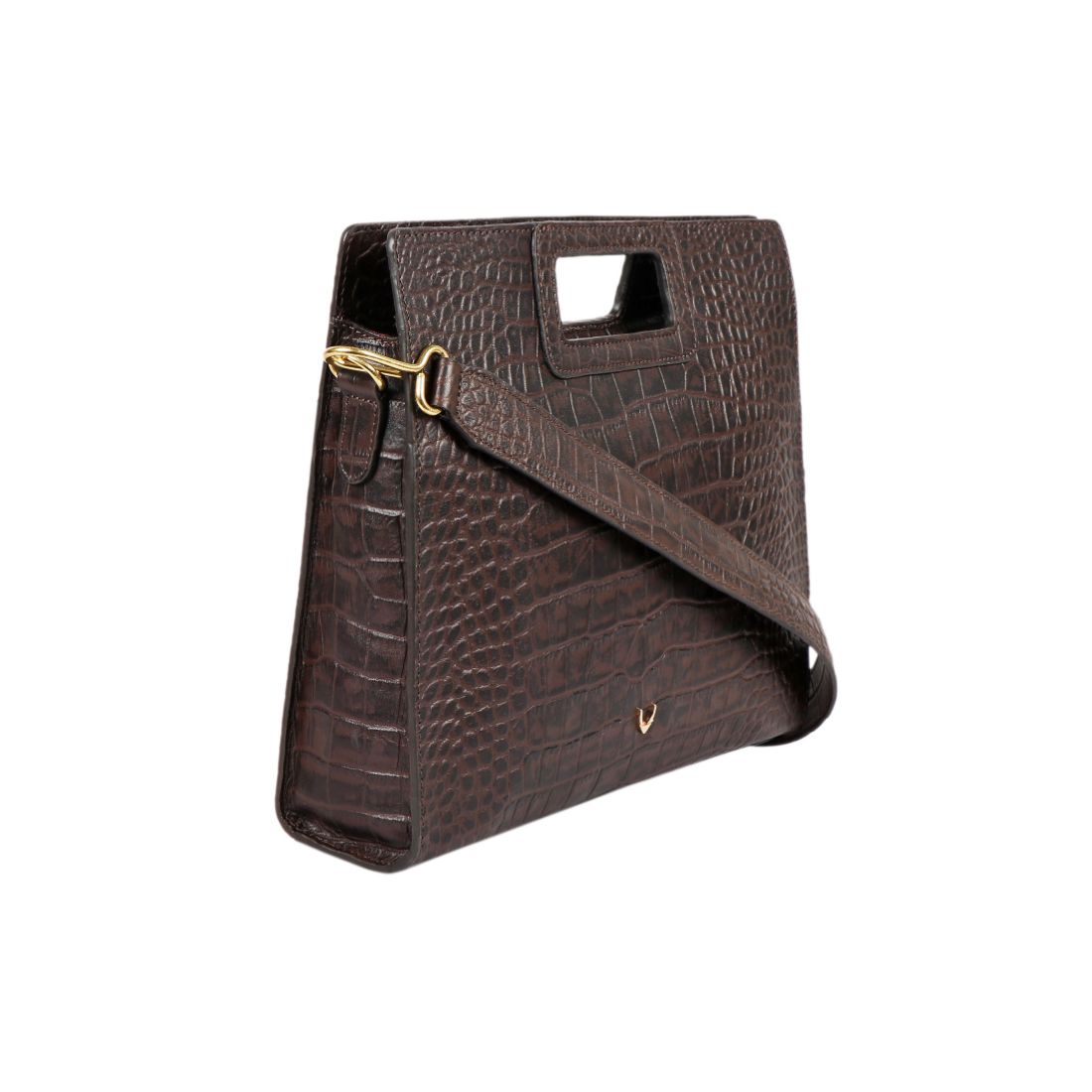 A Hidesign leather handbag in black features a textured design, rectangular cutout handle, and detachable shoulder strap.