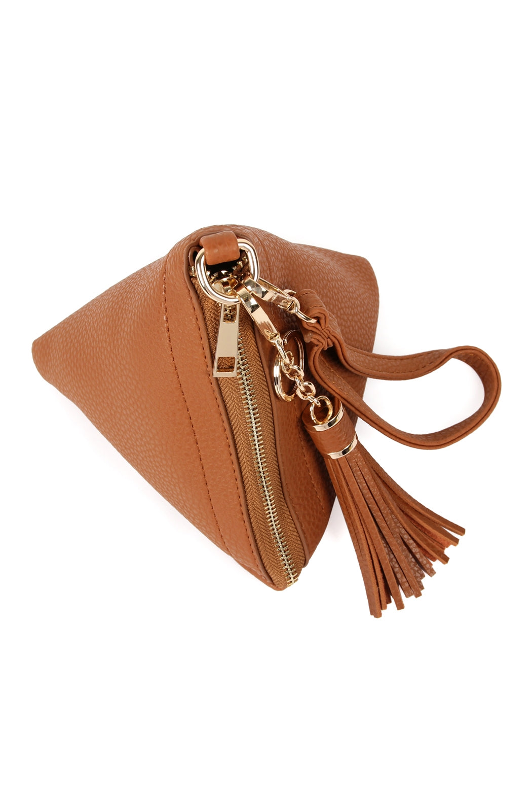 A person in a white shirt and jeans is holding the Riah Fashion Pyramid Shape Tassel Wristlet Leather Bag in orange.