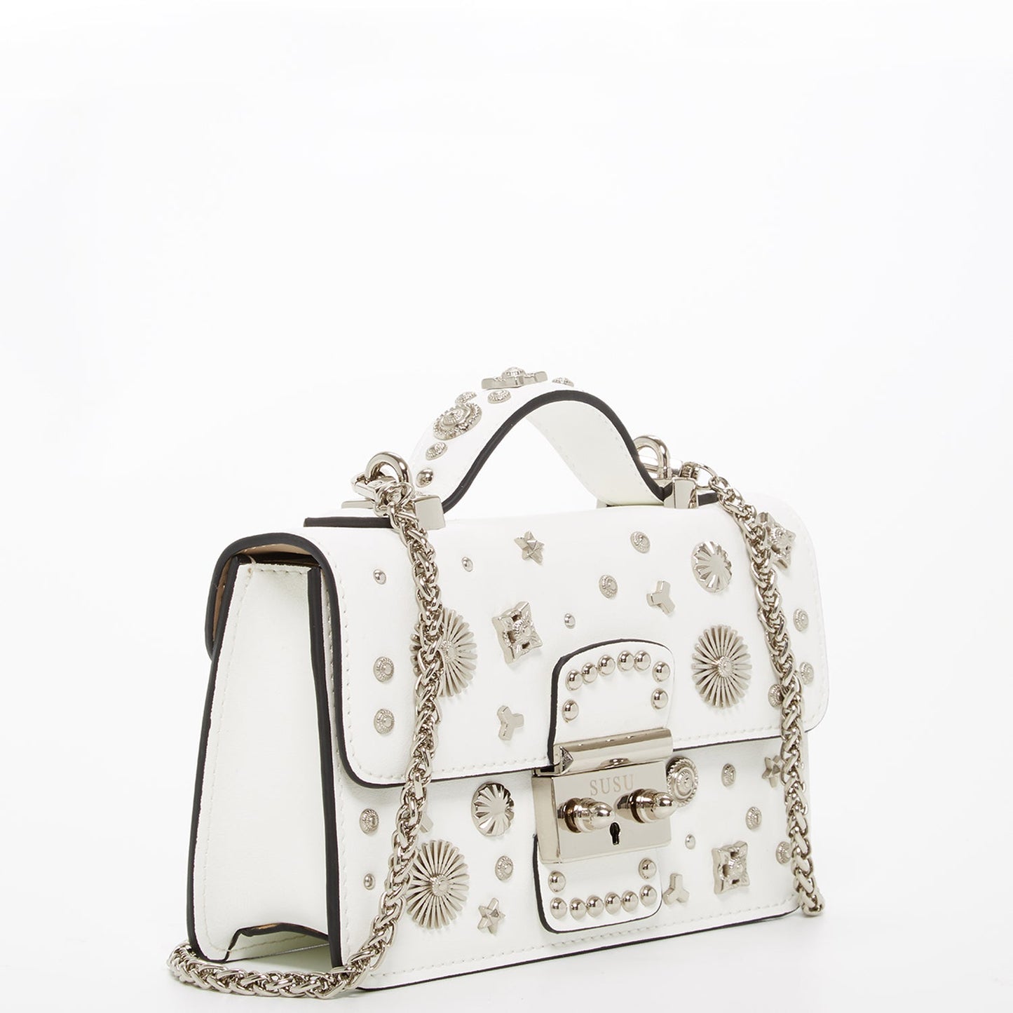 The Hollywood White Leather Crossbody Bag by SUSU features silver stud embellishments, a chain strap, a top handle, and a front clasp with the SUSU brand name.