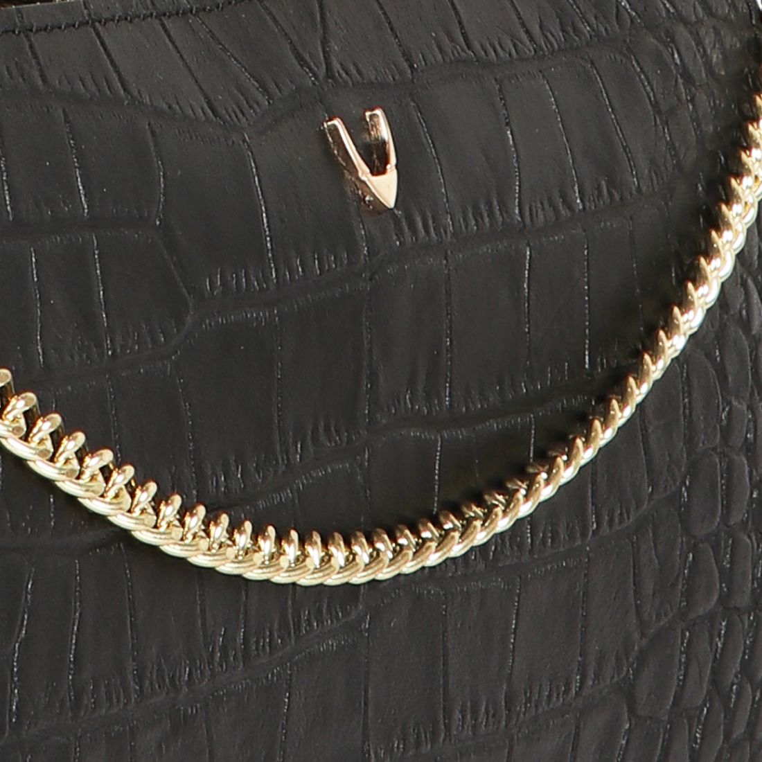 Hidesign Valerie black crocodile-textured handbag featuring a gold chain accent and single shoulder strap against a white background.