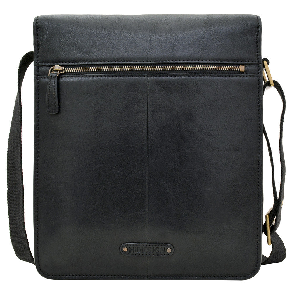 Hidesigns Aiden Genuine Leather Medium Crossbody is a dark brown shoulder bag featuring a wide strap and rectangular brass buckle.