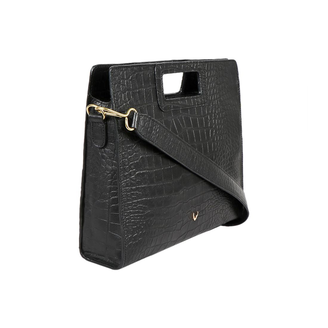 A Hidesign leather handbag in black features a textured design, rectangular cutout handle, and detachable shoulder strap.