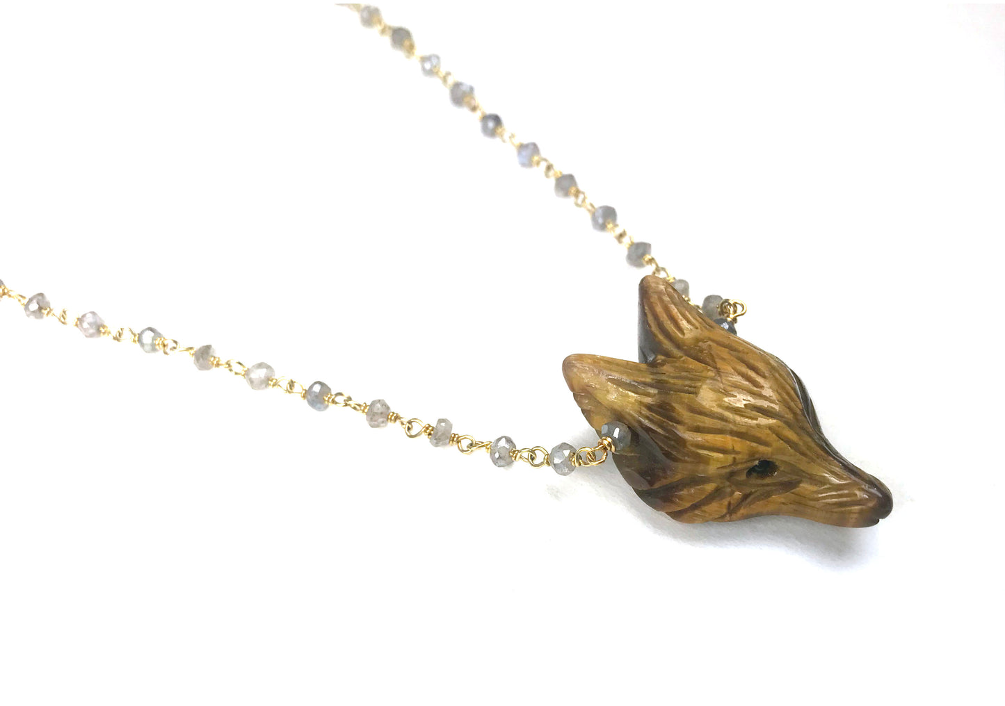 Gena Myints Labradorite and Tiger Eye Fox Necklace features a central fox pendant with an adjustable clasp.