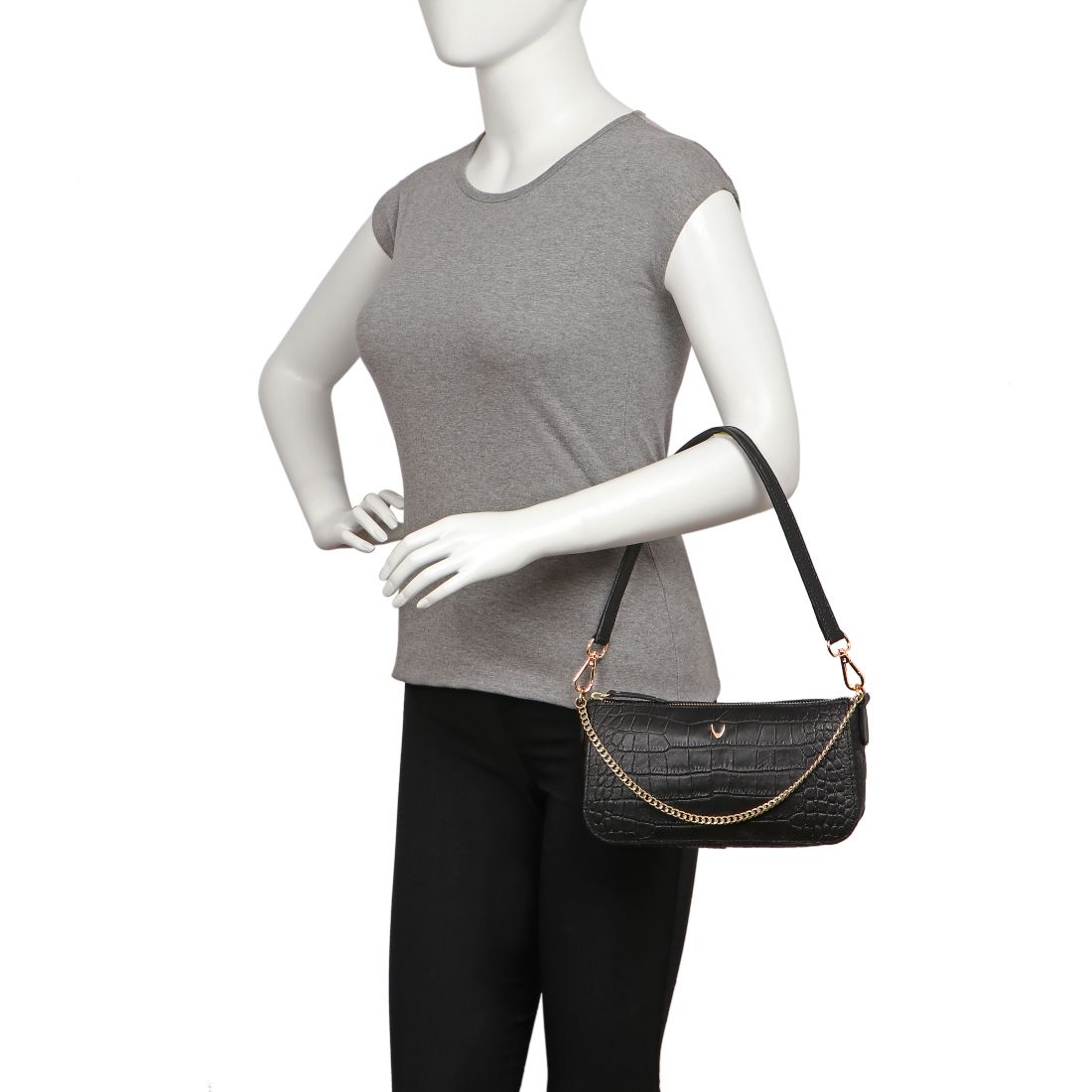 Hidesign Valerie black crocodile-textured handbag featuring a gold chain accent and single shoulder strap against a white background.