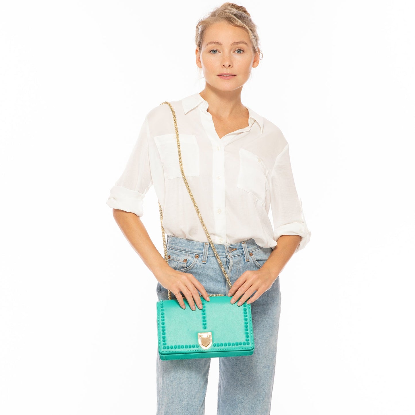 SUSU presents the Josie Green Leather Bag featuring a studded design and a gold chain strap.