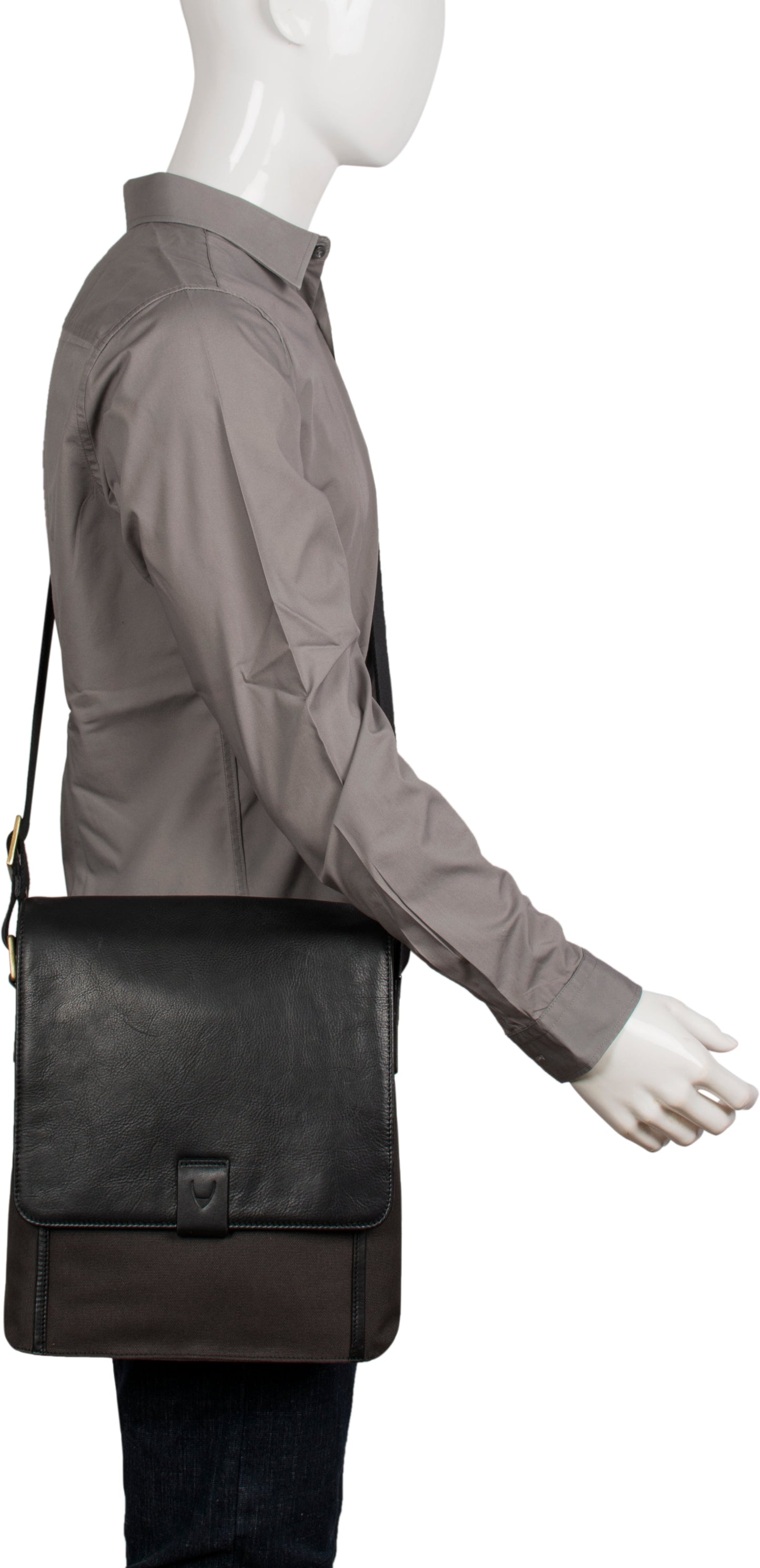 The Aiden Hidesign Blue Genuine Leather and Canvas Crossbody Bag features an adjustable strap and buckle, perfect for men or women as a shoulder, messenger, or travel bag that fits a 10.5 iPad.