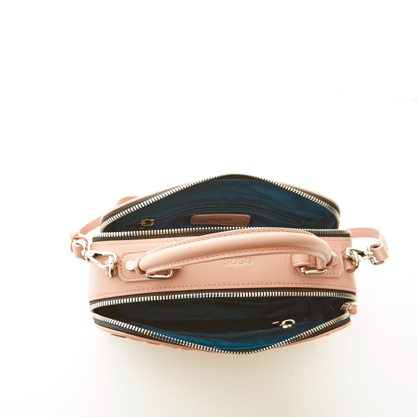 The SUSU Kayla Pink Woven Leather Bag features a textured front pattern, top handles, and a detachable shoulder strap.