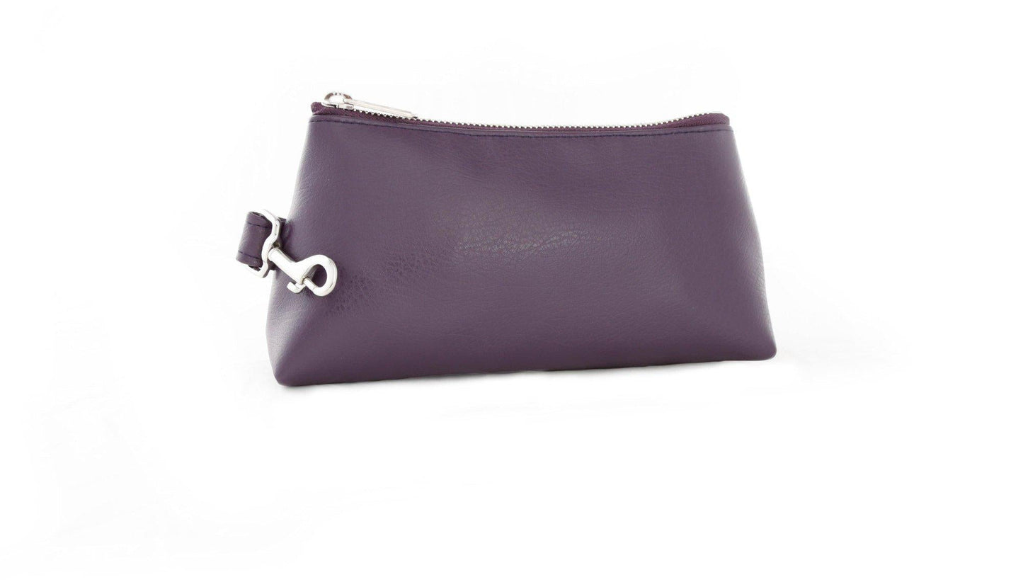 A Pretty Purple Vegan Leather Bag by KEYPER features a gold zipper and strap, showcased on a white background.