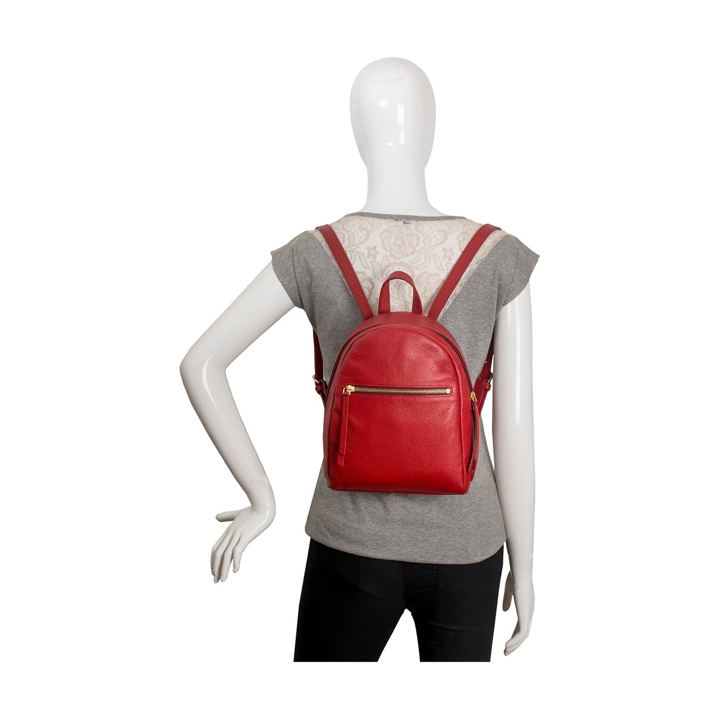 Mannequin showcasing a Kiwi Small Leather Backpack by Hidesign, elegantly draped over a gray shirt.