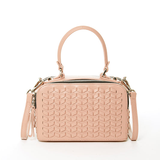 The SUSU Kayla Pink Woven Leather Bag features a textured front pattern, top handles, and a detachable shoulder strap.