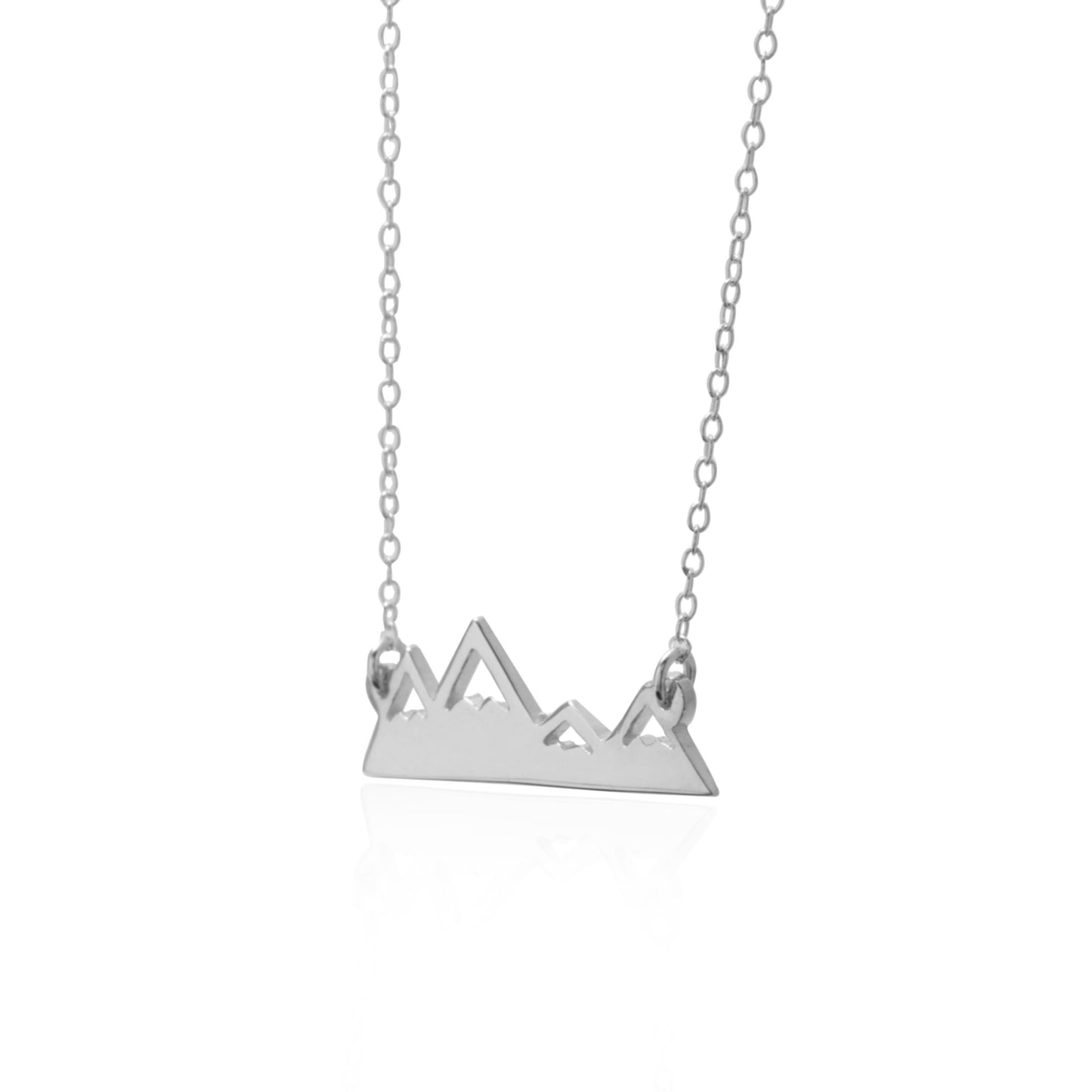 The Sincerely Silver Mountain Range Necklace features a minimalist pendant of a mountain range on a delicate silver chain.