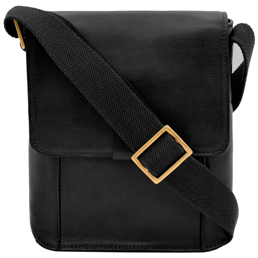 The Aiden Genuine Leather Mini Crossbody by Hidesign is a brown leather shoulder bag featuring a flap cover and an adjustable fabric strap with a brass buckle.