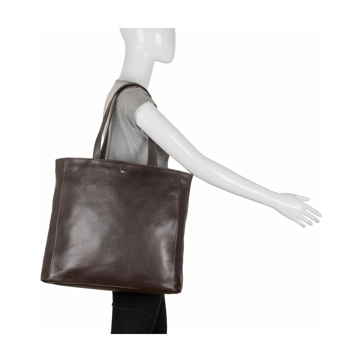 The Clara Large Leather Tote by Hidesign is a large blue leather bag featuring two handles and a small gold logo near the top center.