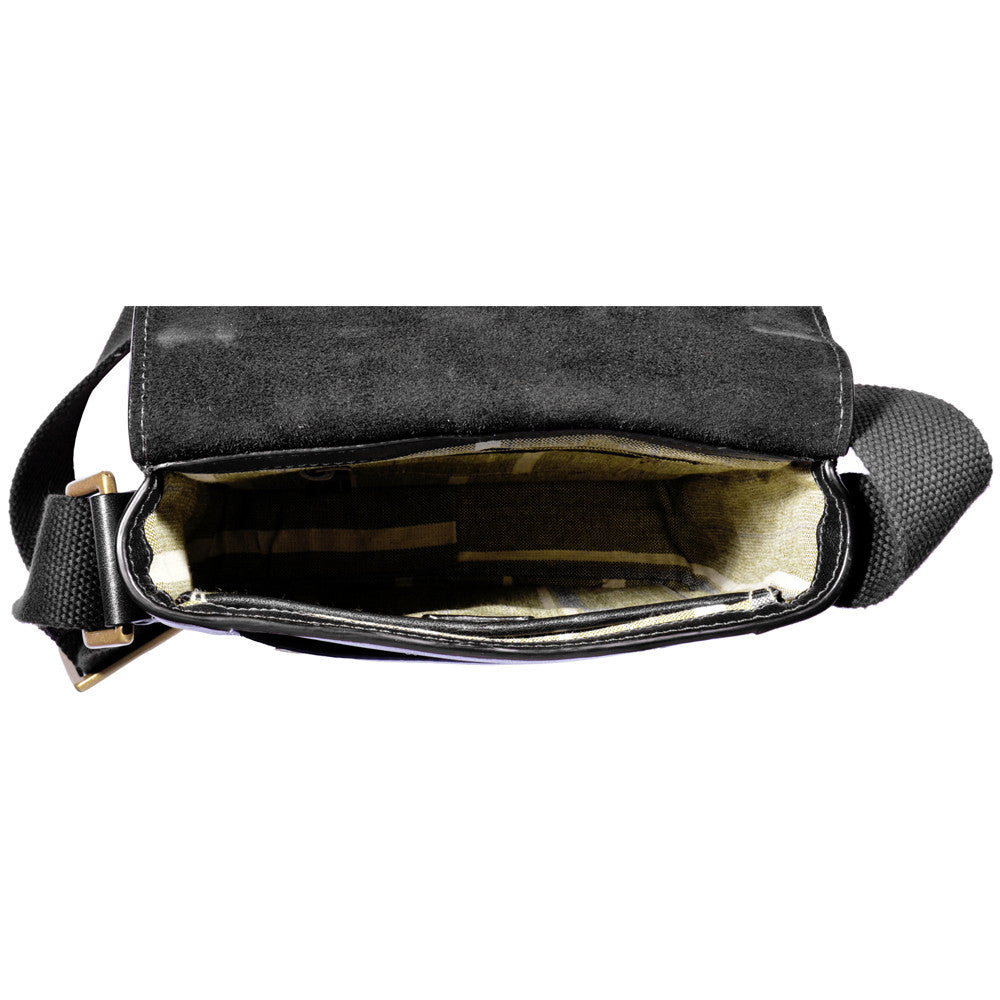 The Aiden Genuine Leather Mini Crossbody by Hidesign is a brown leather shoulder bag featuring a flap cover and an adjustable fabric strap with a brass buckle.