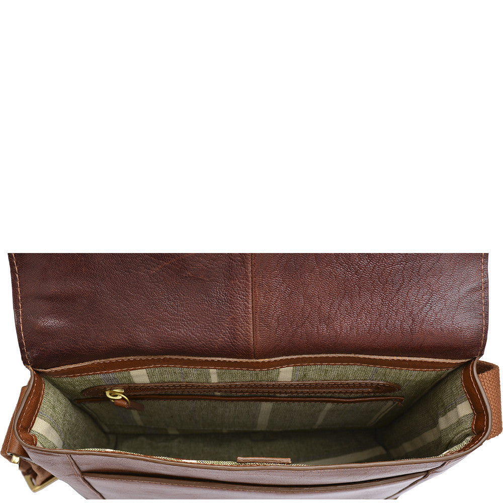 The Aiden Genuine Leather Mini Crossbody by Hidesign is a brown leather shoulder bag featuring a flap cover and an adjustable fabric strap with a brass buckle.