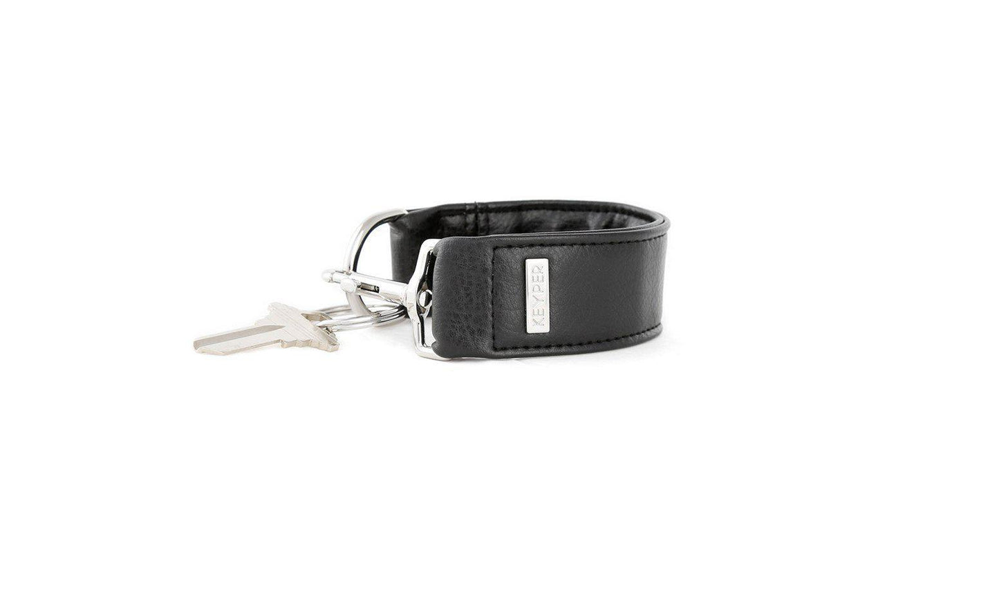 The Classic Black Vegan Leather KEYPER® Key Ring by KEYPER features a black leather wristband with a gold keyring that holds two keys.