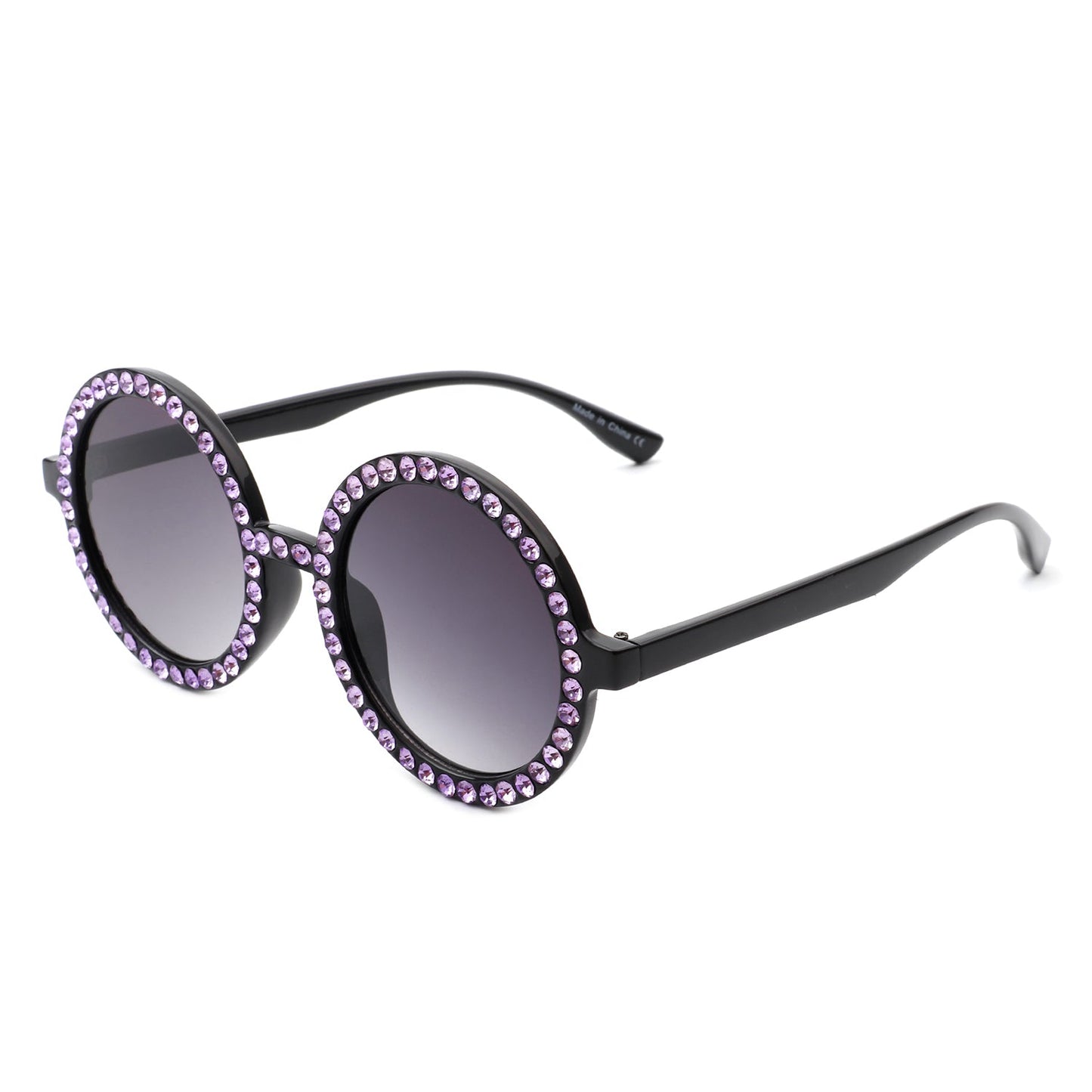 Round sunglasses by Cramilo Eyewear, Dreamwey model, featuring rhinestone-studded white frames with dark lenses.
