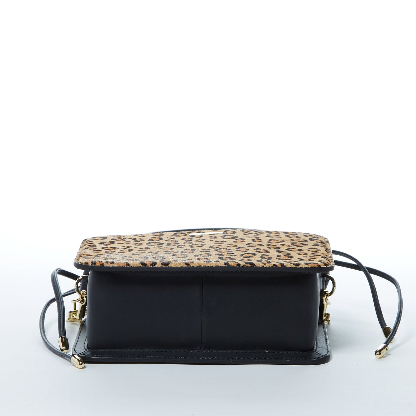 The Patricia Black Leopard Leather Purse by SUSU features a leopard print, black leather accents, drawstring closure, detachable strap, and gold hardware.