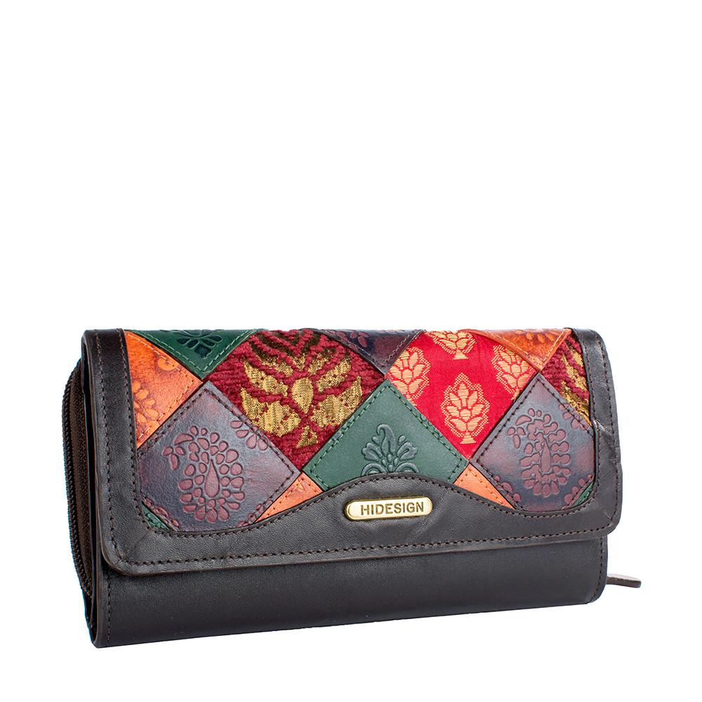 The Hidesign Baga RFID Blocking Trifold Leather Wallet offers a colorful patchwork design with red, green, and orange patterns.