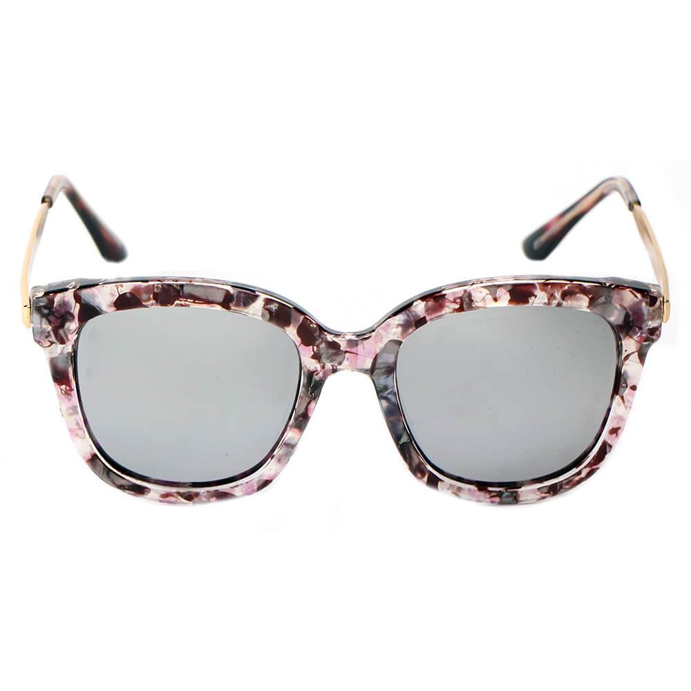 The DEKALB Womens Oversize sunglasses by Cramilo Eyewear feature floral rims, thin gold arms, and silver mirrored lenses.