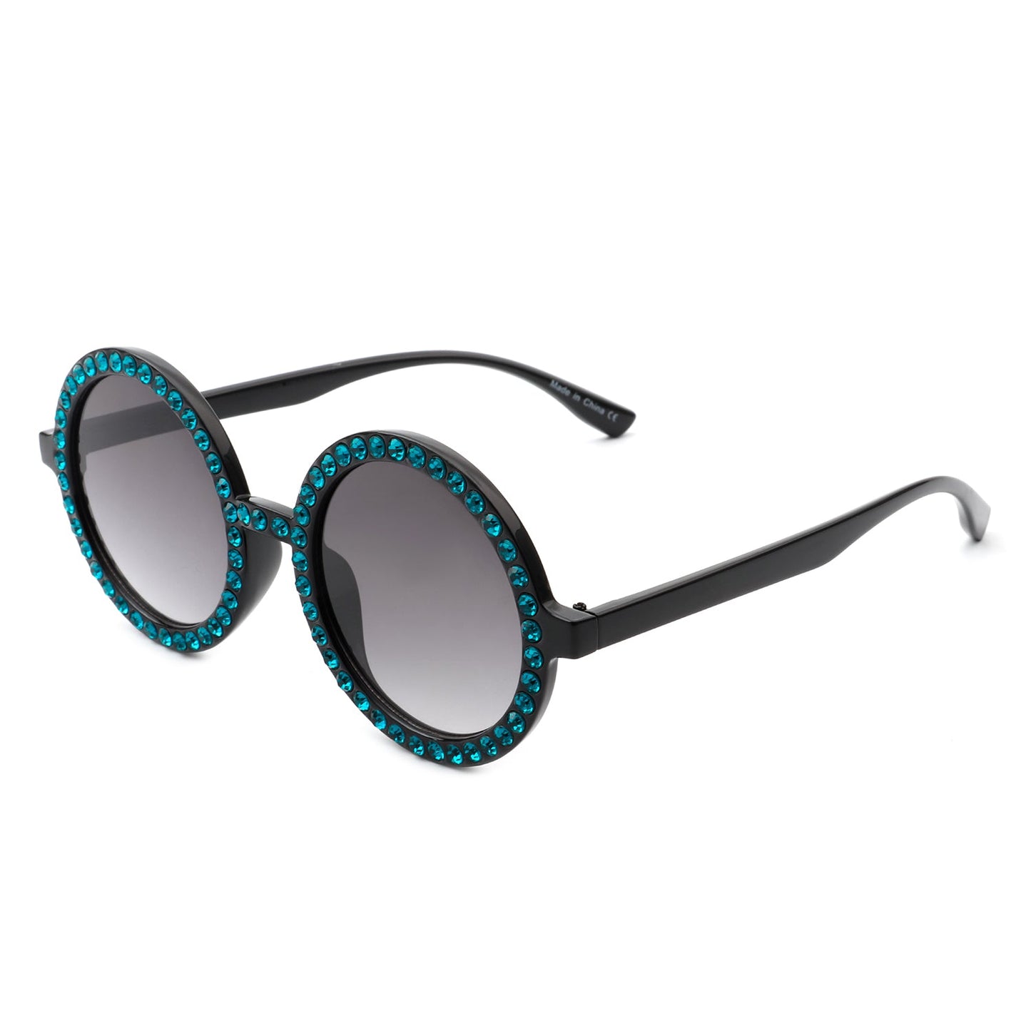 Round sunglasses by Cramilo Eyewear, Dreamwey model, featuring rhinestone-studded white frames with dark lenses.