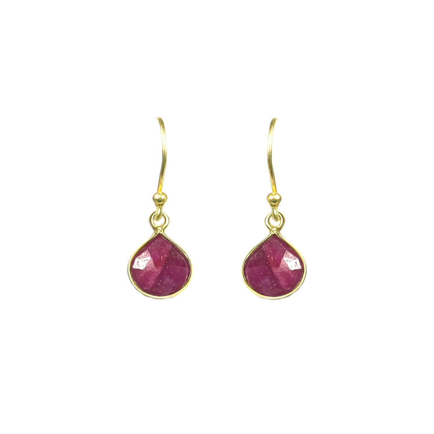 Gena Myints Ruby Bezel Drop Earrings feature gold hook settings with teardrop-shaped pink stones.