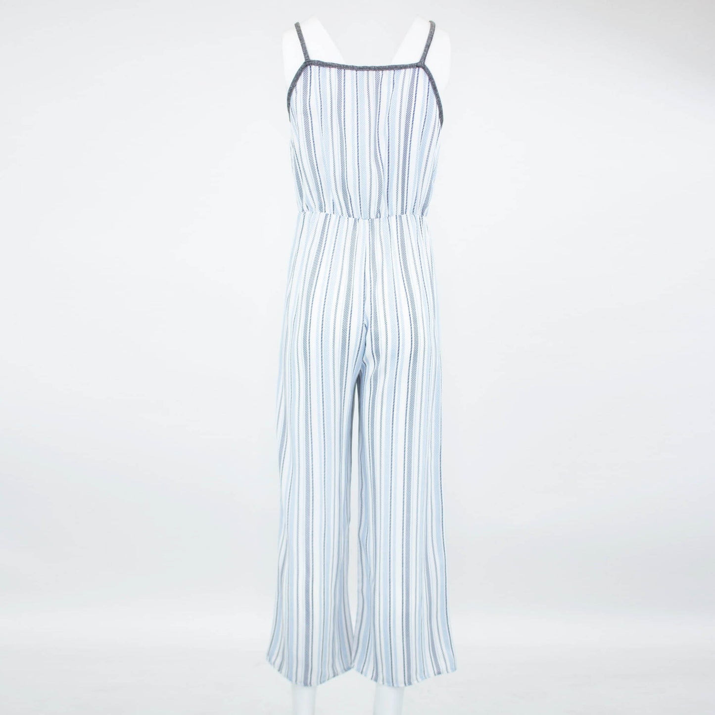 Someone is wearing the Stylespect Front Tie Cropped Jumpsuit in blue with stripes and wide legs, paired with beige pointed heels.