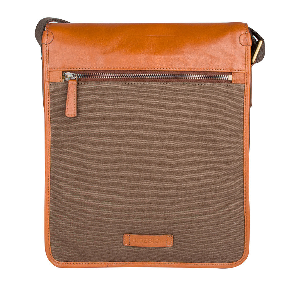 The Aiden Hidesign Blue Genuine Leather and Canvas Crossbody Bag features an adjustable strap and buckle, perfect for men or women as a shoulder, messenger, or travel bag that fits a 10.5 iPad.