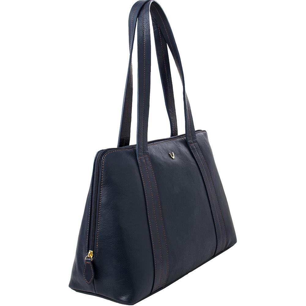 The Hidesign Cerys Leather Multi-Compartment Tote is a brown handbag featuring two straps and a minimal stitching design.