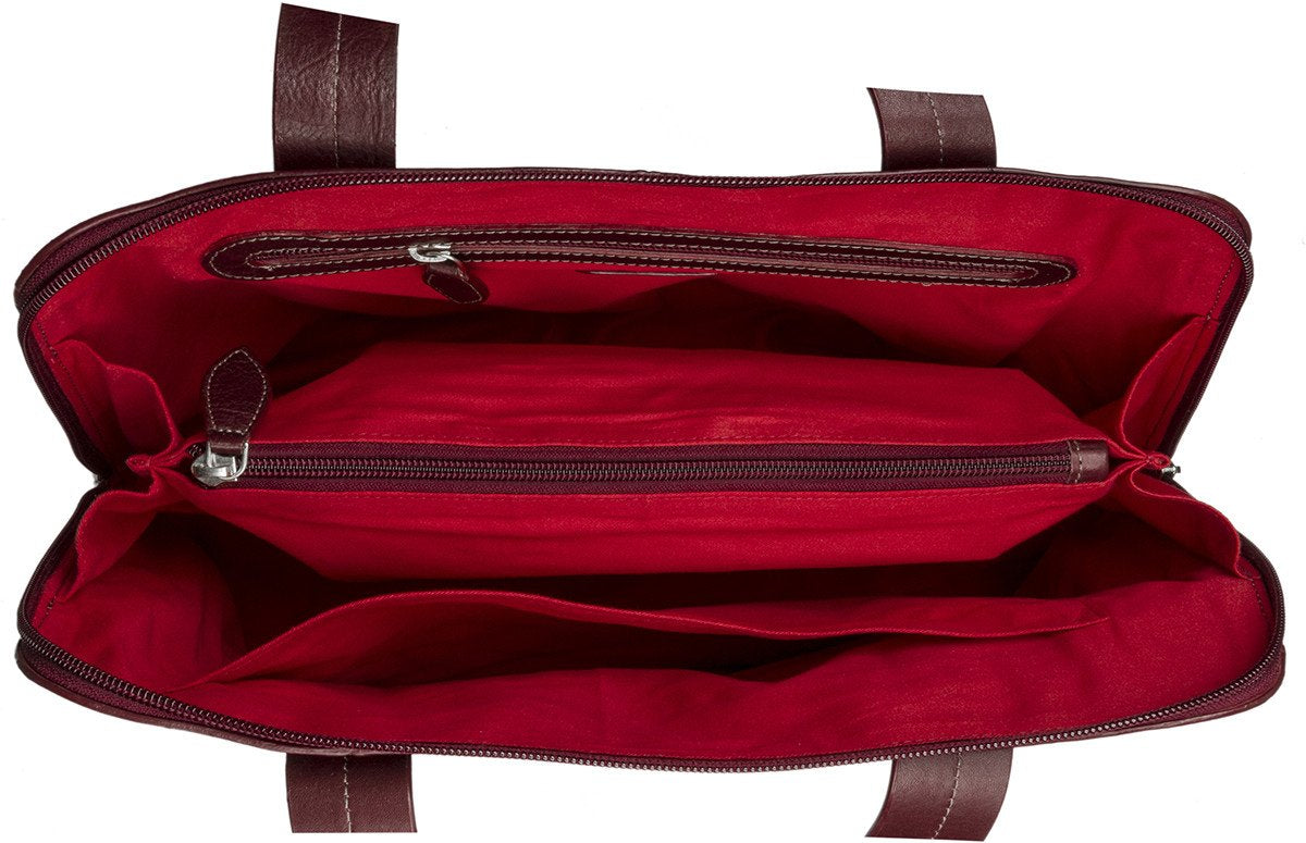 The Hidesign Cerys Leather Multi-Compartment Tote is a brown handbag featuring two straps and a minimal stitching design.