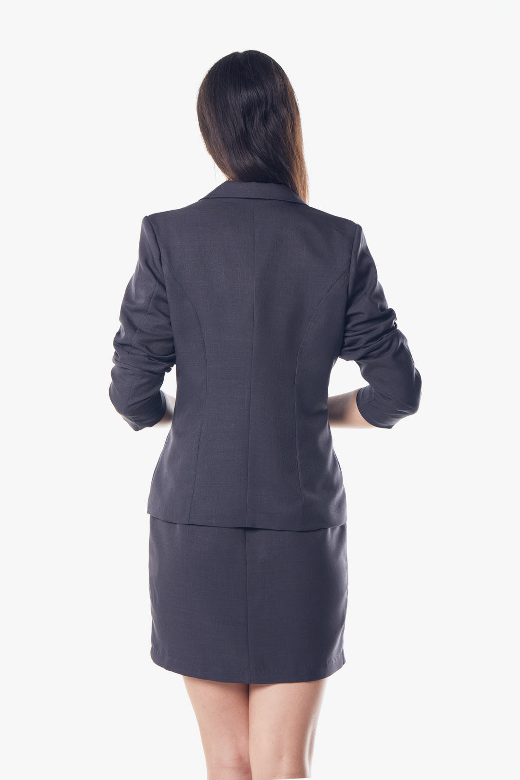 Someone wearing a Le Réussi® Classy Charcoal Wool Blazer and knee-high boots, accentuated with a patterned scarf, poses against a plain backdrop.