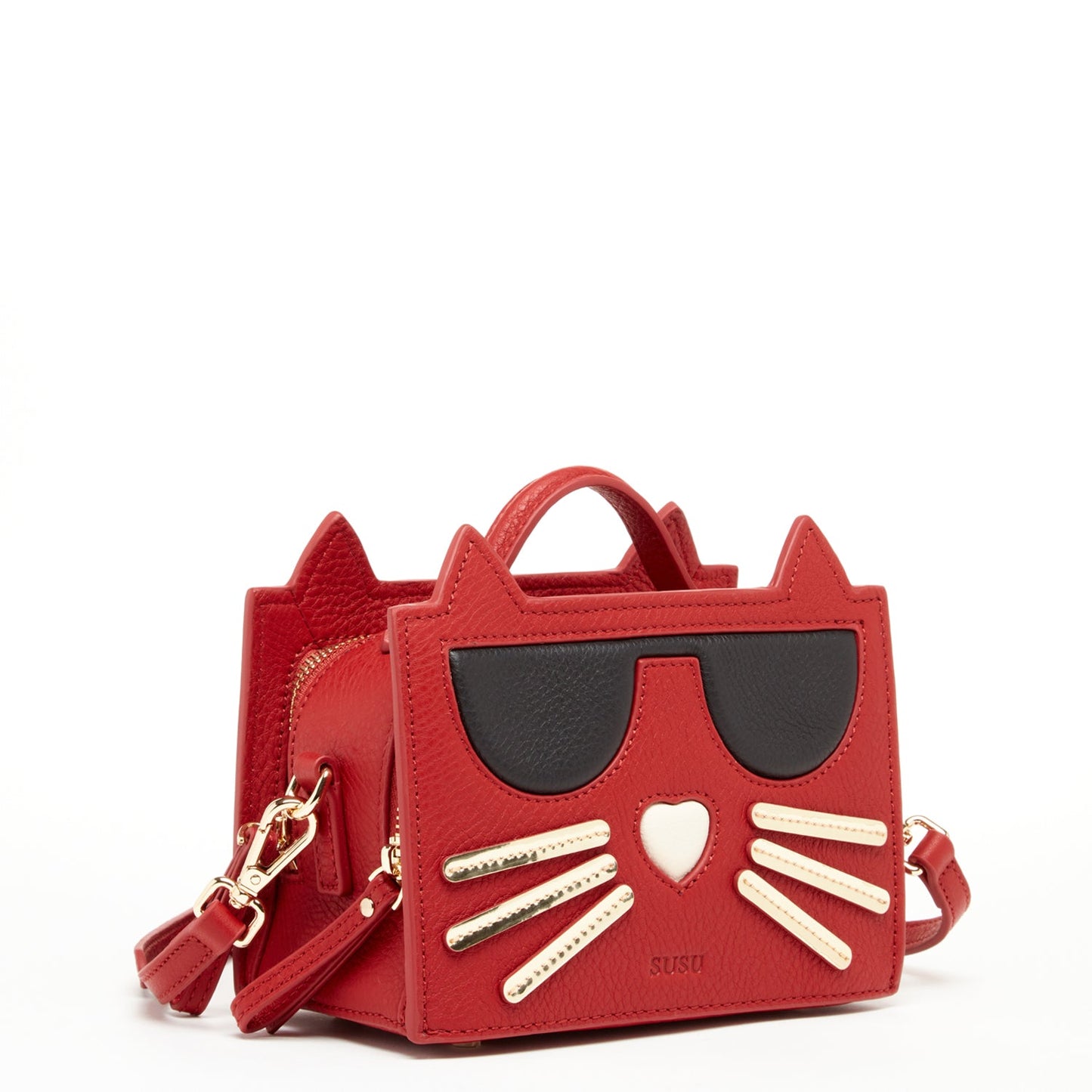 The SUSU Leather Cat Bag Red Crossbody resembles a cat, adorned with black sunglasses, a heart-shaped nose, and whisker detailing.