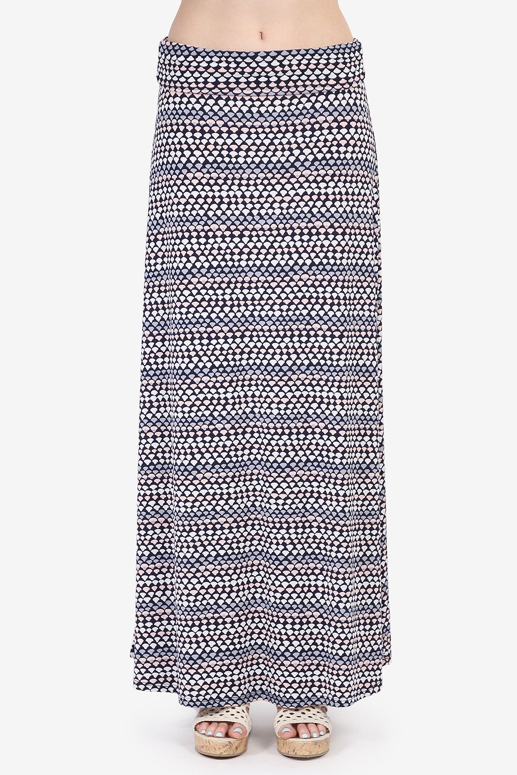 A person wearing a Simple Patterned Maxi Skirt by Riah Fashion and open-toed sandals.