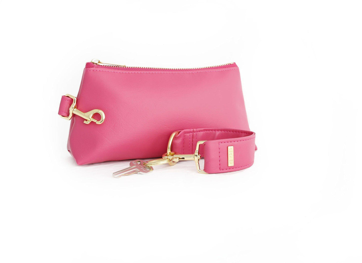 The KEYPER Bright Pink Vegan Leather 2-Piece WRISTLET SET includes a small pink pouch with a zipper, gold clasp, an attached pink strap, and a set of keys.