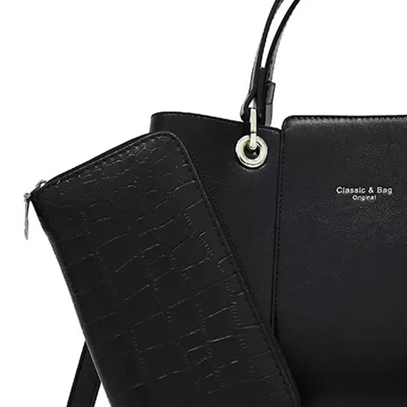 The Aaliyah Faux Crocodile Handbag Set (2-Pack) by Savoy Active includes a black handbag with a short handle, detachable shoulder strap, and circular charm, along with a matching textured wallet.