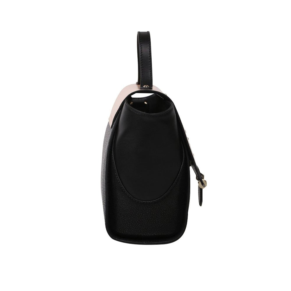 The Koi Small Black Satchel by Bellorita is a handbag with a black body, a tan flap adorned with fish designs, and decorative pearls.