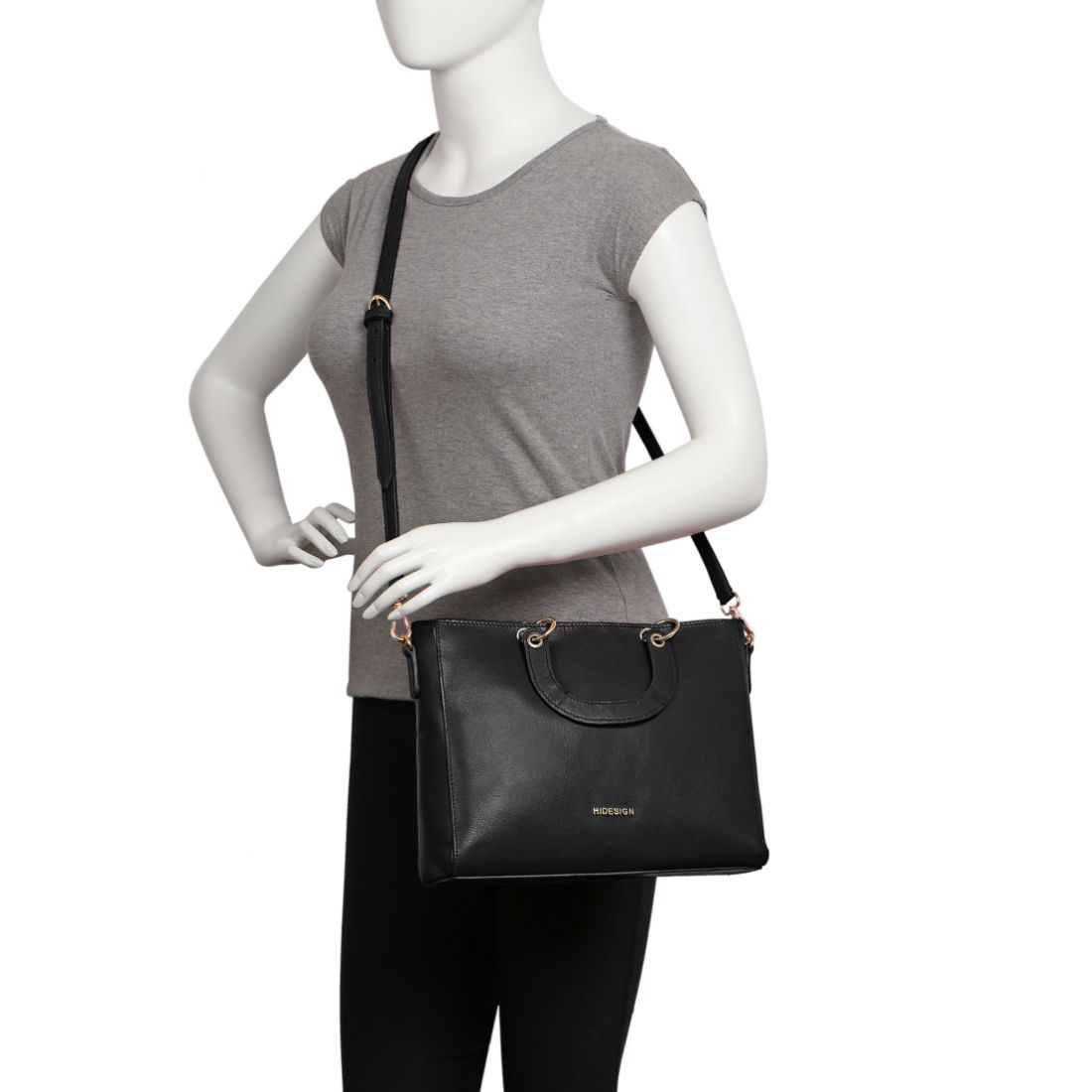 The Hidesign Life New Womens Leather Handbag is a red satchel with dual top handles, a detachable shoulder strap, gold-tone hardware, and the brand logo on the front.