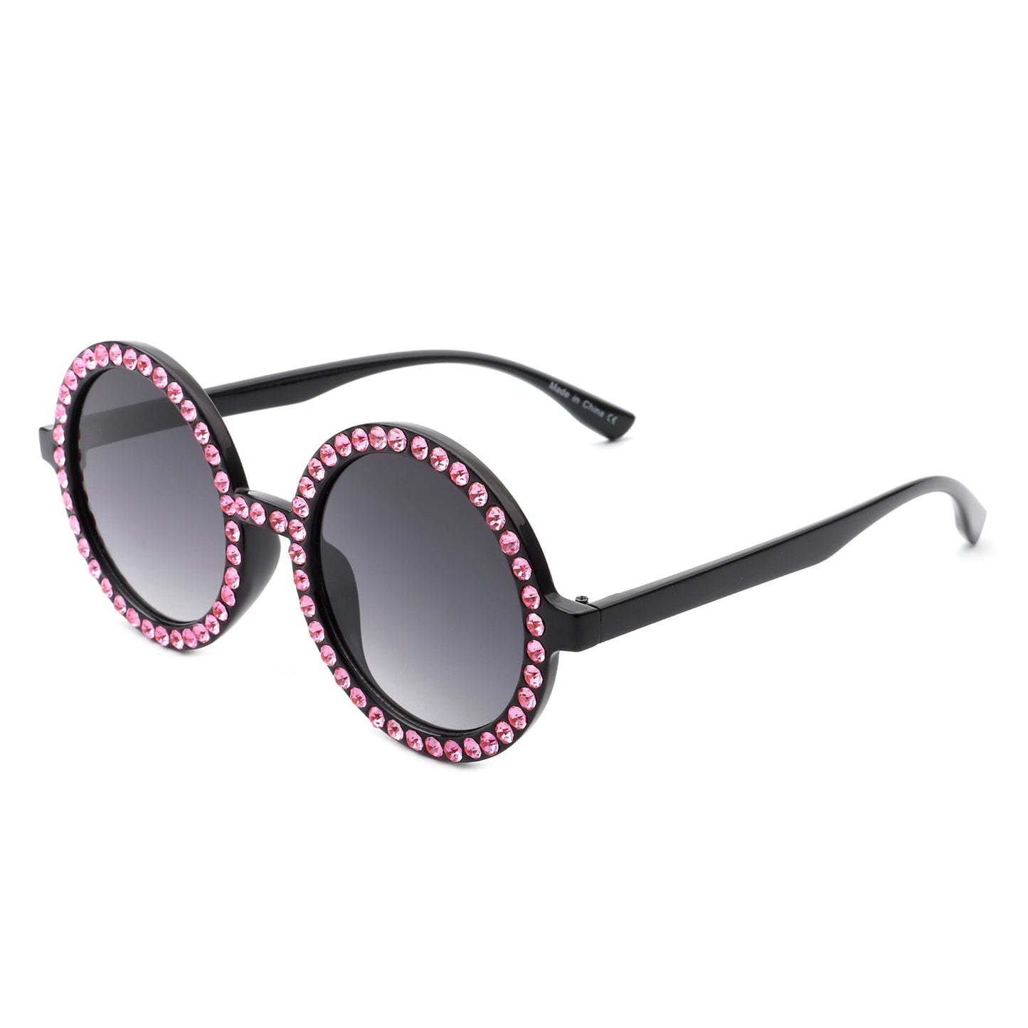 Round sunglasses by Cramilo Eyewear, Dreamwey model, featuring rhinestone-studded white frames with dark lenses.