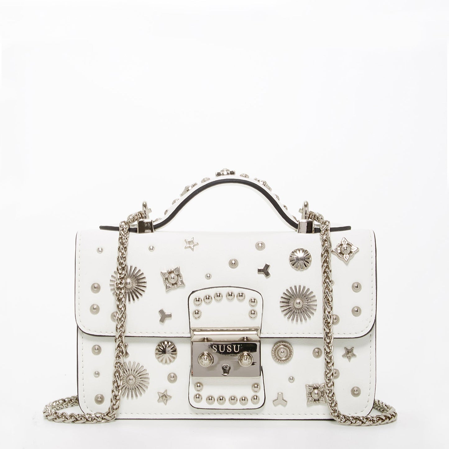 The Hollywood White Leather Crossbody Bag by SUSU features silver stud embellishments, a chain strap, a top handle, and a front clasp with the SUSU brand name.