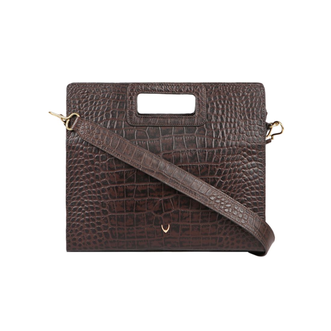 A Hidesign leather handbag in black features a textured design, rectangular cutout handle, and detachable shoulder strap.