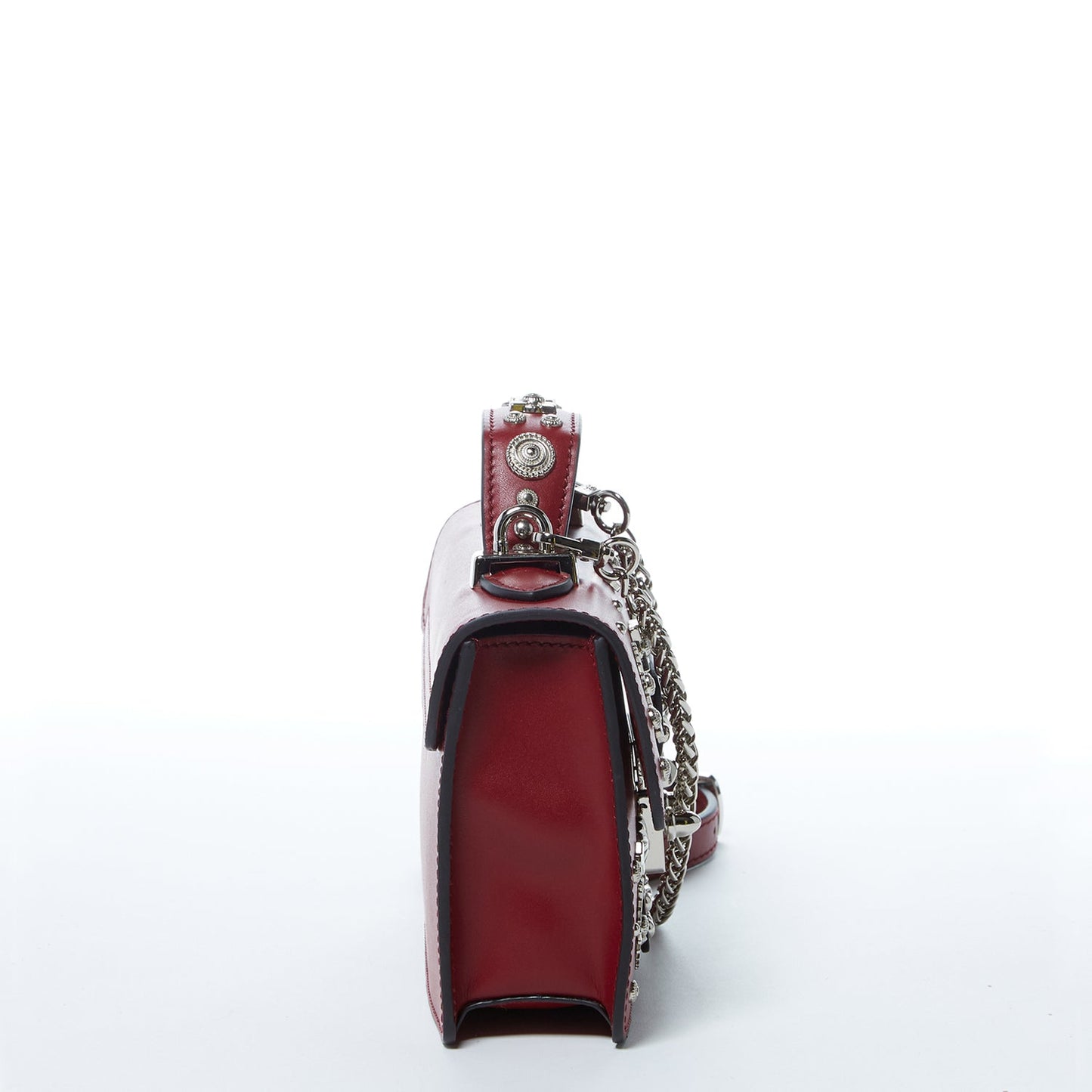 Burgundy leather handbag with silver studs, a short handle, and chain shoulder strap, featuring a SUSU engraved metal clasp.